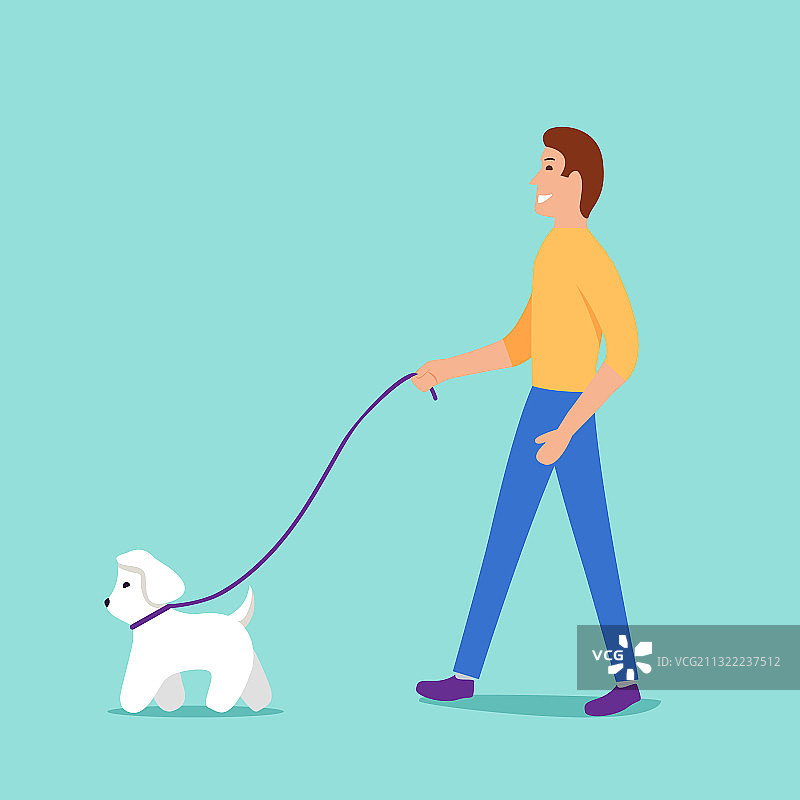 一个年轻人牵着狗绳遛狗是个概念图片素材