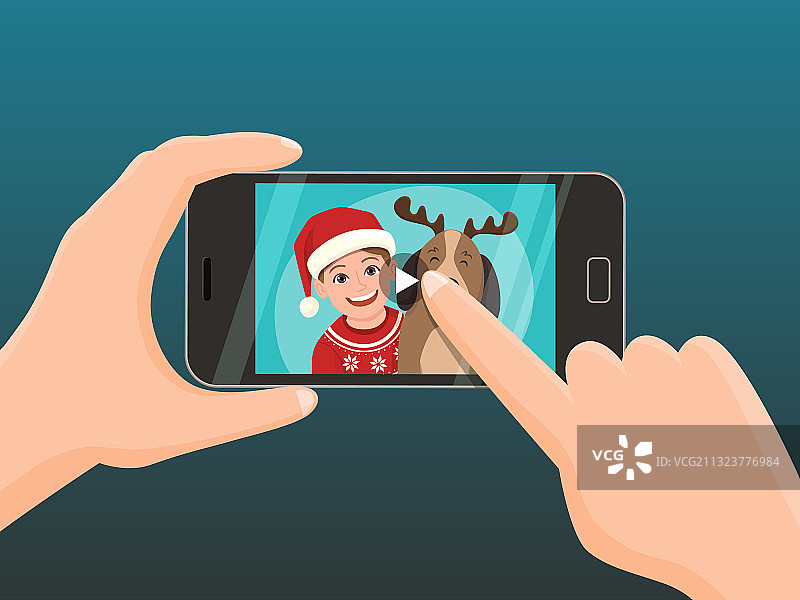 带有圣诞祝福视频的智能手机图片素材