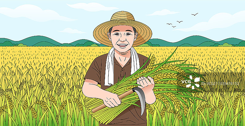 一个农民在田野前抱着稻谷图片素材