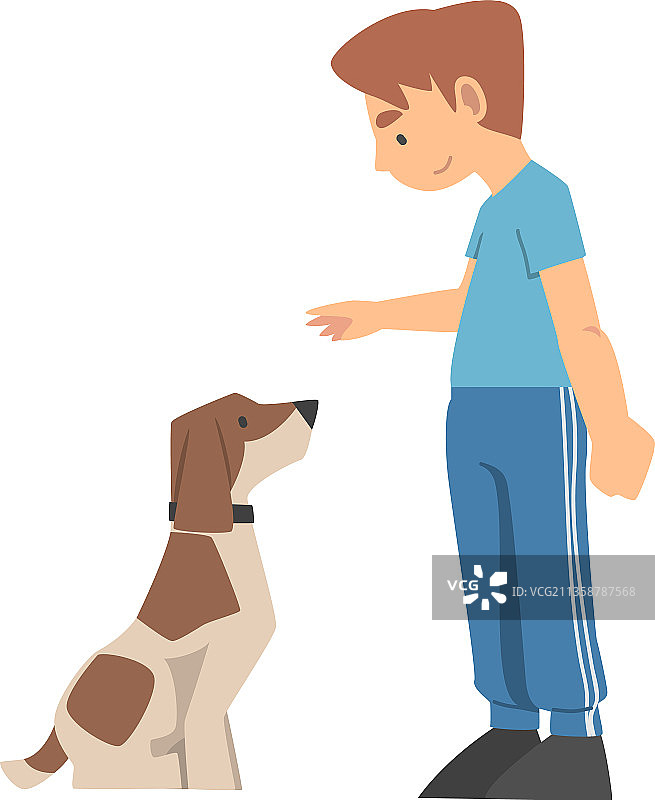 一个小男孩训练他的狗，教他发号施令图片素材