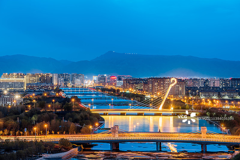 中国内蒙古呼和浩特马头琴桥城市风光夜景图片素材