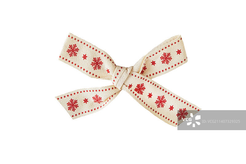白色背景上红色雪花的圣诞蝴蝶结图片素材