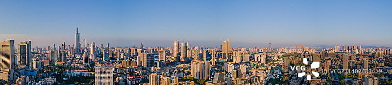 日出阳光照耀下的南京主城区风光全景图图片素材