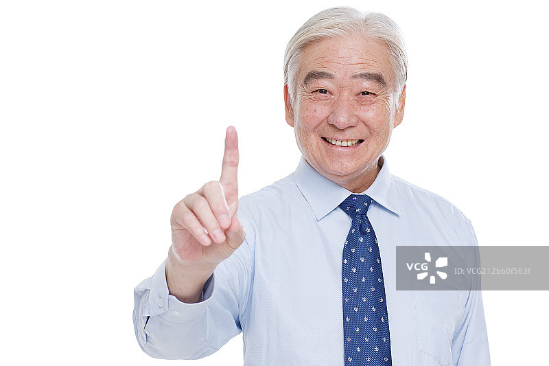 一个老年男人伸出食指在做手势图片素材