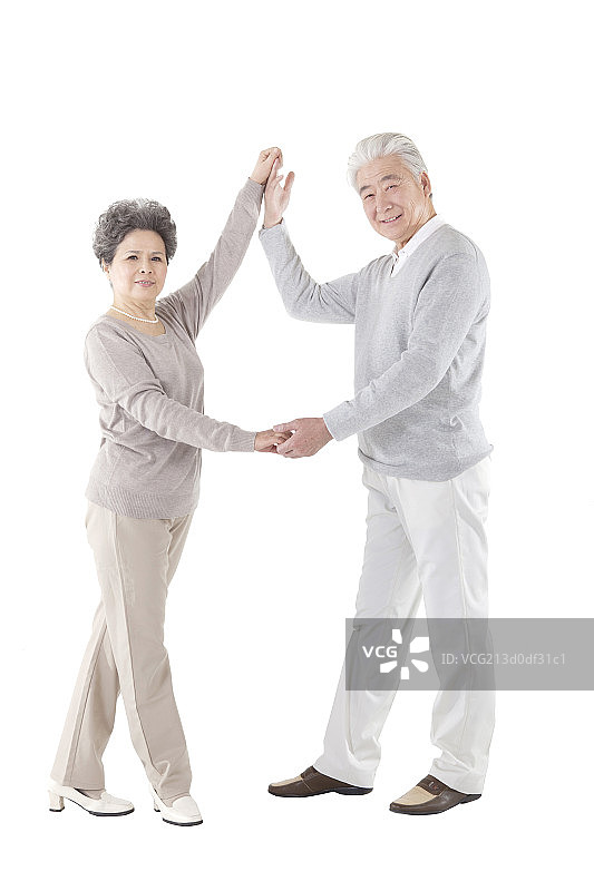 东方中老年夫妇跳舞图片素材