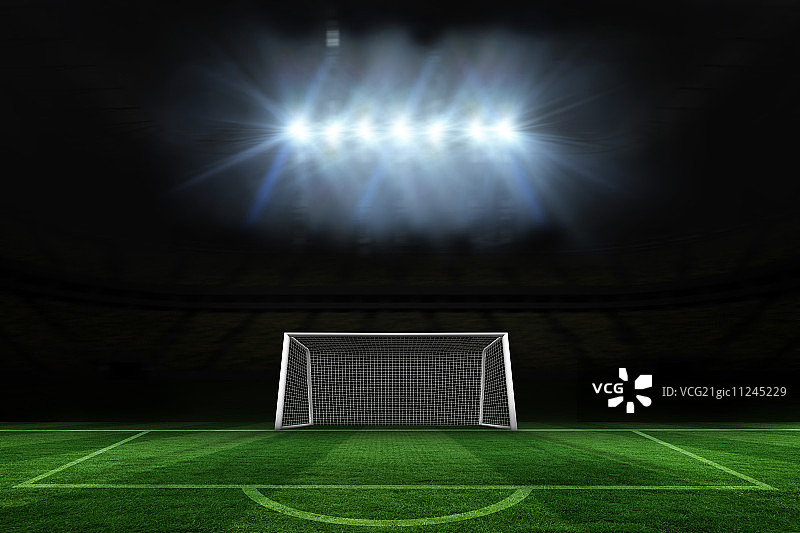 聚光灯下的数字生成足球场和球门图片素材