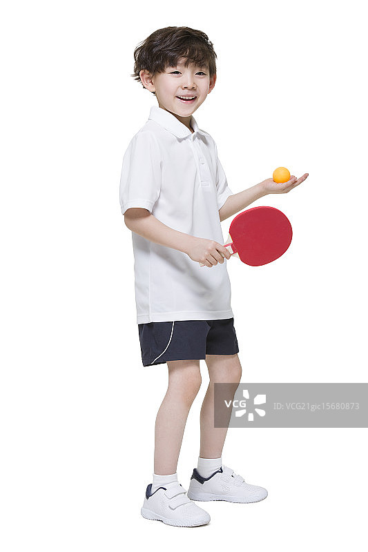 可爱的小男孩打乒乓球图片素材