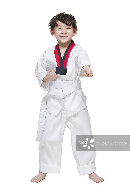 可爱的小男孩练跆拳道图片素材