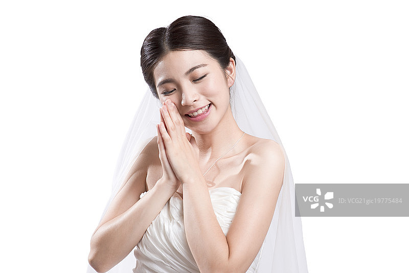 Portrait of young bride wishing图片素材