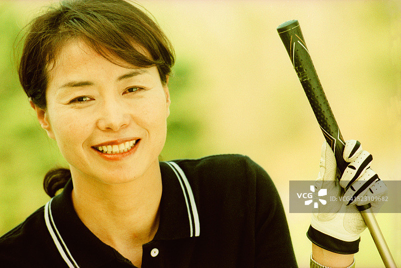 微笑的高尔夫球手图片素材