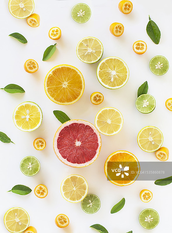 鲜柑橘类水果片图案背景设计。图片素材