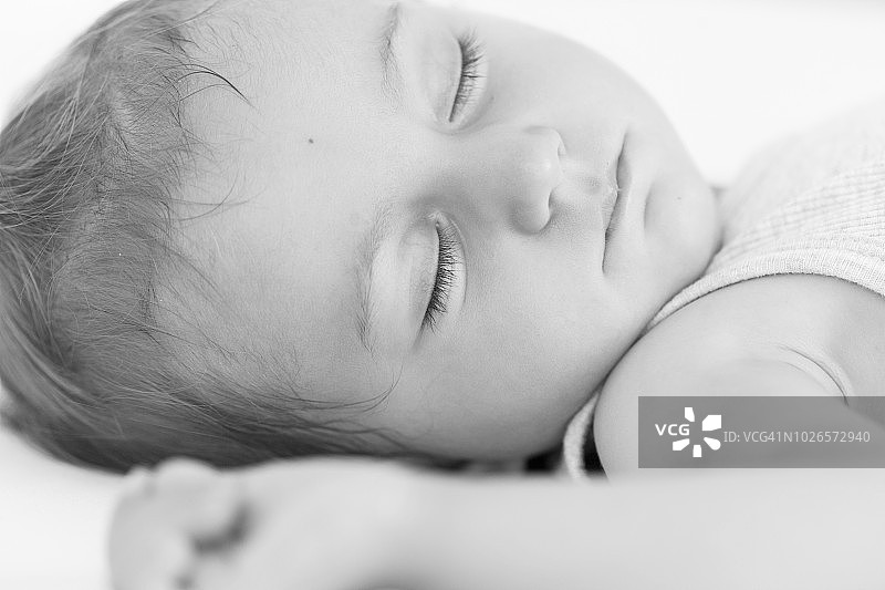 婴儿脸睡觉的特写图片素材