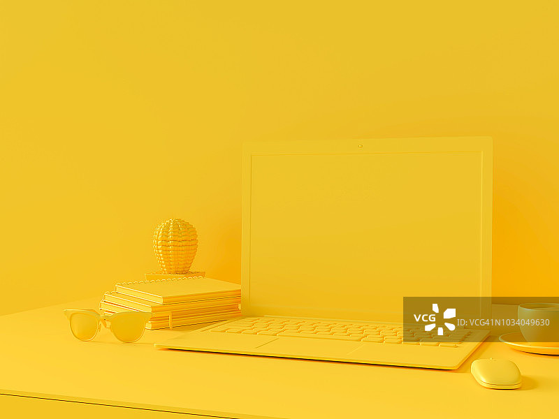 简约概念，桌上放笔记本电脑黄色办公桌图片素材