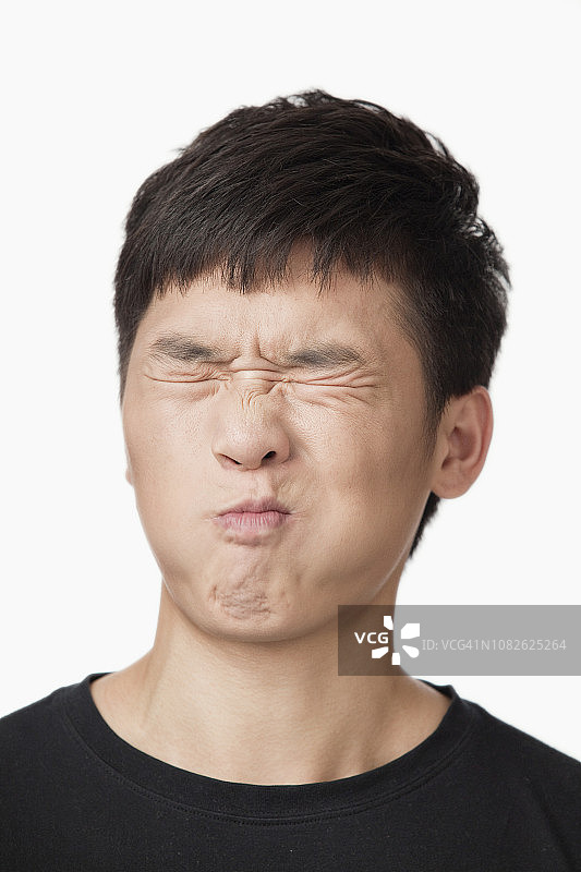 中国男人做个鬼脸图片素材