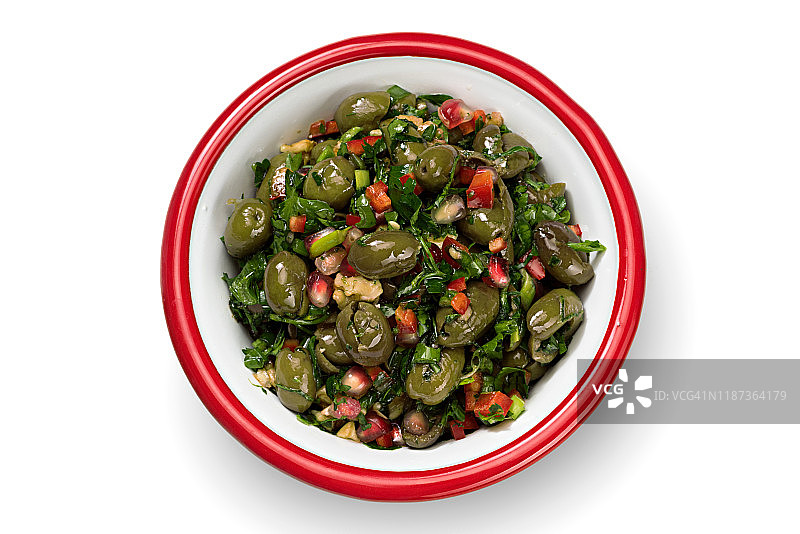碗里的绿橄榄和石榴籽图片素材