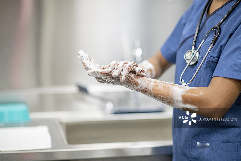 医护人员洗手穿着医疗手术服库存照片图片素材
