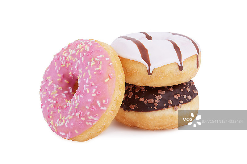 一堆美味的甜甜圈，彩色的点缀在白色的背景上图片素材