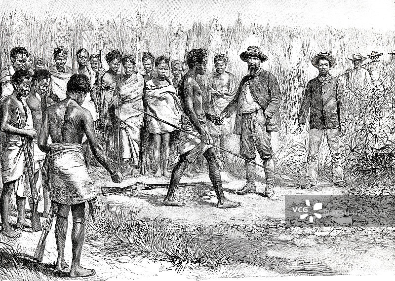 一个马达加斯加人在和一个白人打招呼图片素材