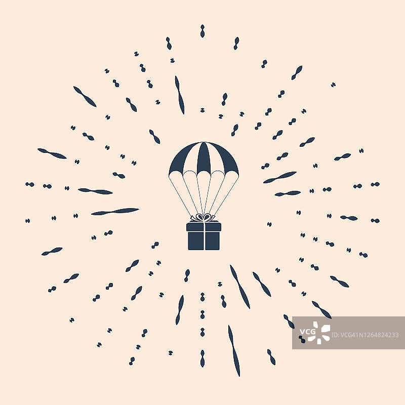 黑色礼盒飞行降落伞图标隔离在米色backgr图片素材