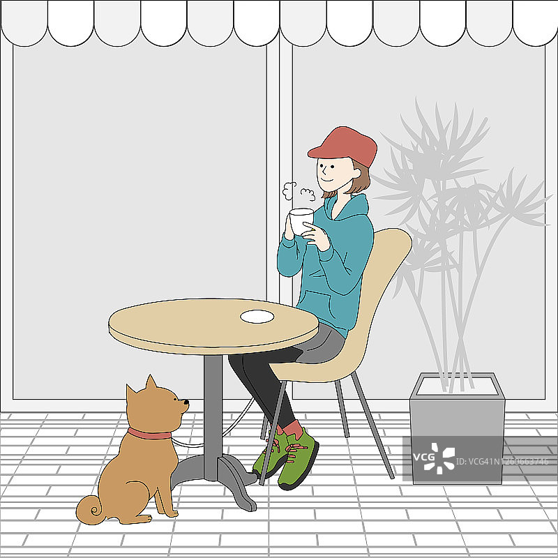一个女人在狗咖啡馆喝茶图片素材
