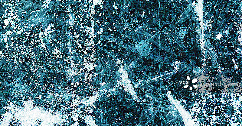 冰面上的划痕和冰上曲棍球场的雪地背景俯视图图片素材