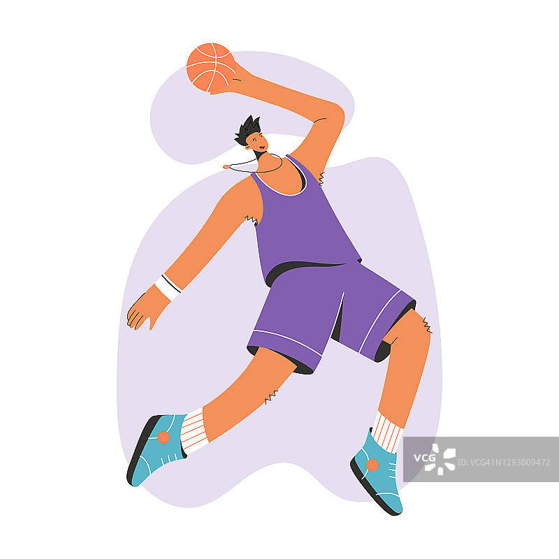 穿制服的篮球运动员带着球跳图片素材