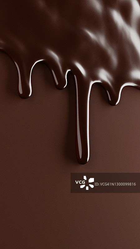 融化的巧克力滴在棕色的背景上图片素材