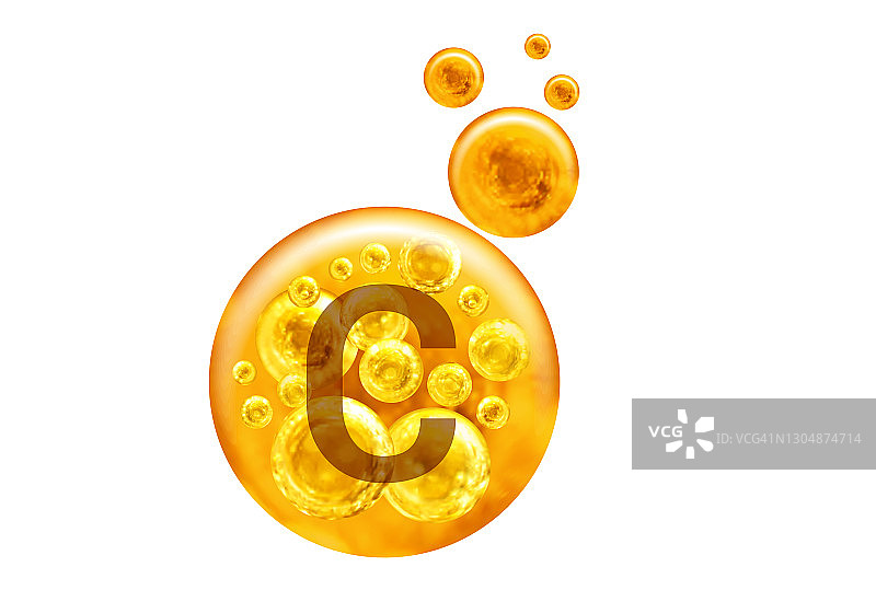 维生素C胶囊。白色背景上带有孤立气泡的金色小球。健康的生活方式的概念。图片素材