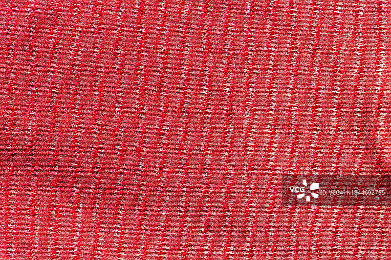 红色运动服装面料，足球衬衫，针织质地和织物背景。图片素材