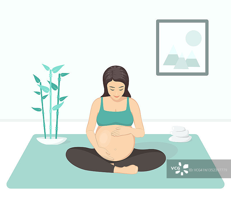 孕妇练习瑜伽和冥想图片素材