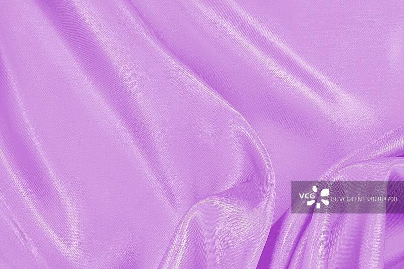 紫色粉彩织物纹理背景，丝绸或亚麻布图案的细节。图片素材