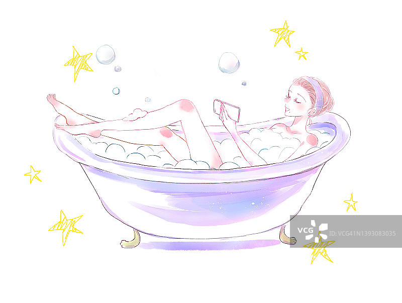 一个女人在浴缸里看智能手机图片素材