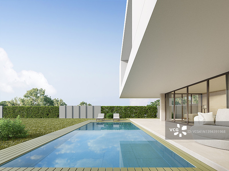 3d渲染的现代豪华住宅，带木制露台和游泳池。图片素材