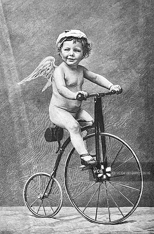 天使爱骑着一辆一便士一便士的自行车图片素材