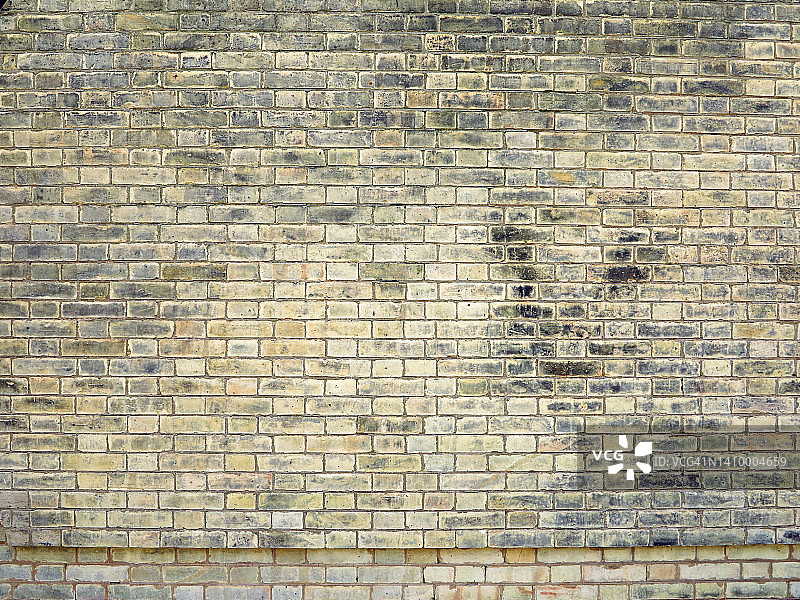 空的和风化的黄灰砖墙，在英国伦敦，英国图片素材