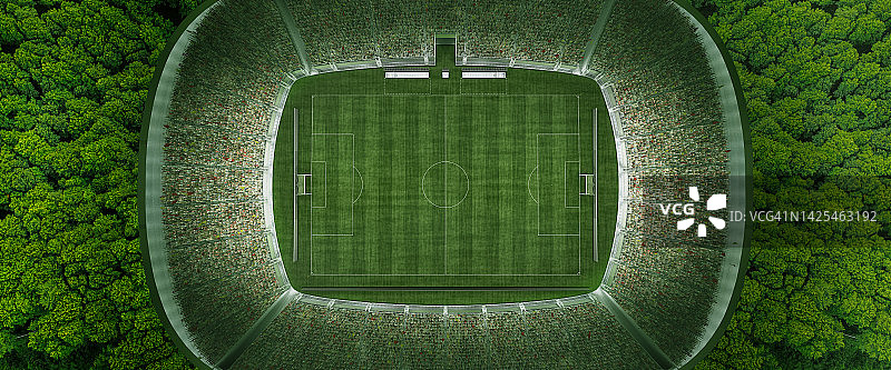 鸟瞰图。体育的概念，竞争，胜利，行动。比赛场地，足球场。总绿色。茂密森林中的足球场图片素材