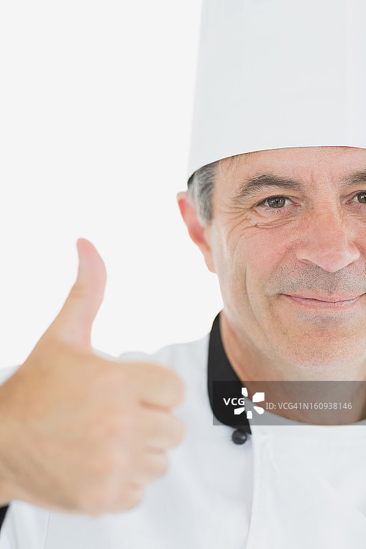 厨师竖起大拇指的裁剪图像图片素材