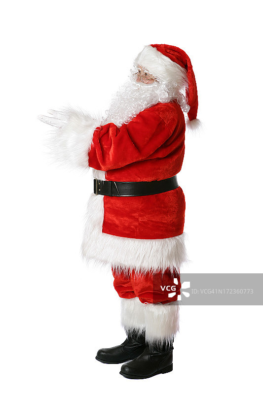 圣诞老人拿着东西(白色的孤立)图片素材
