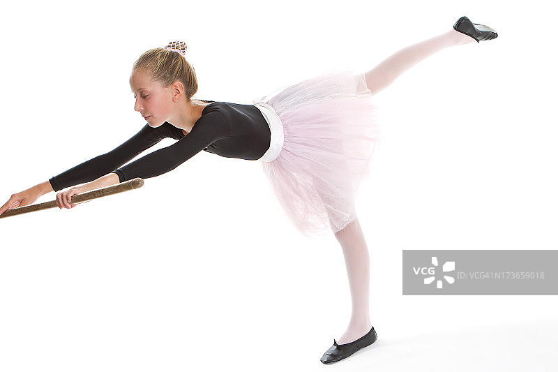 白色背景上的少女芭蕾舞者图片素材