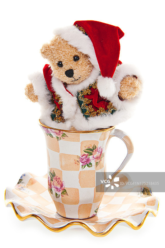 古董茶杯里的泰迪熊圣诞老人图片素材