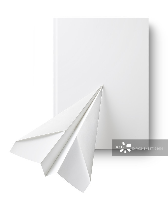纸飞机在书上图片素材