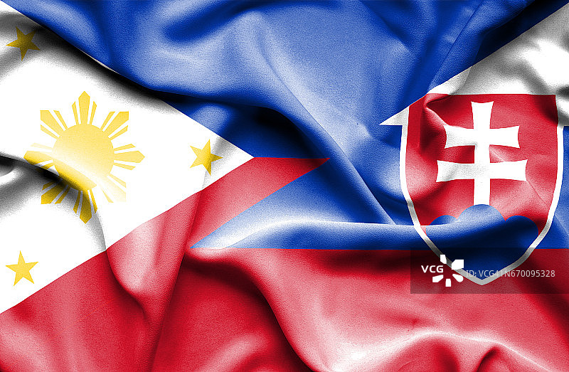 挥舞着斯洛伐克和菲律宾的旗帜图片素材