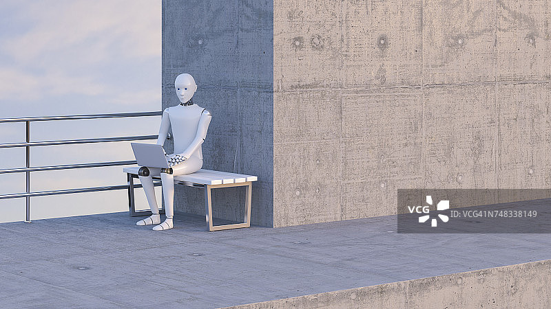 机器人坐在长凳上，用笔记本电脑图片素材