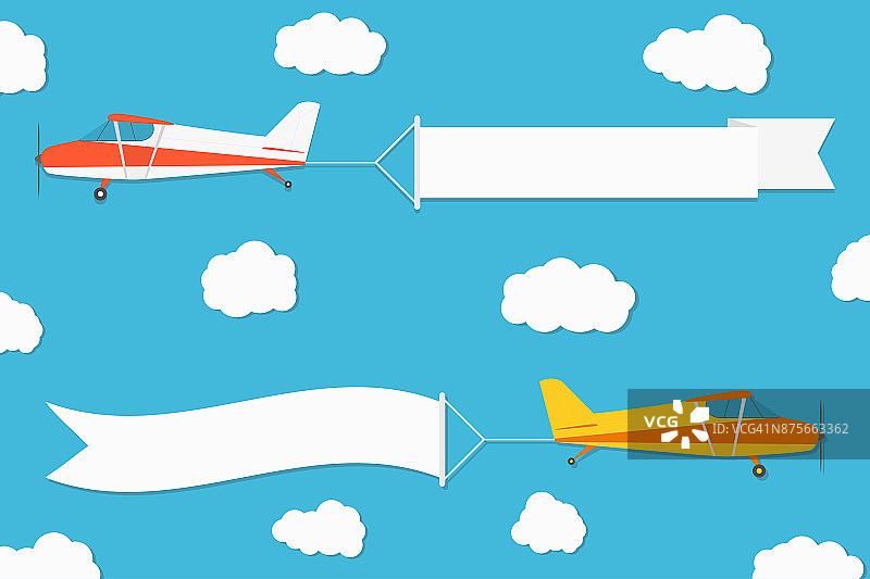 飞广告横幅。飞机与水平横幅在蓝天背景图片素材