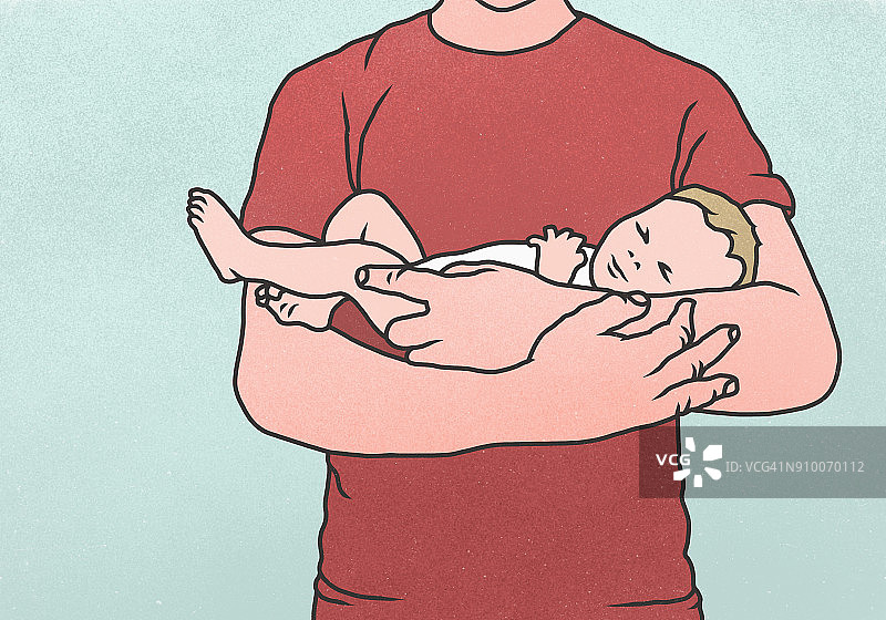 在蓝色背景下，父亲抱着新生婴儿的腹部图片素材