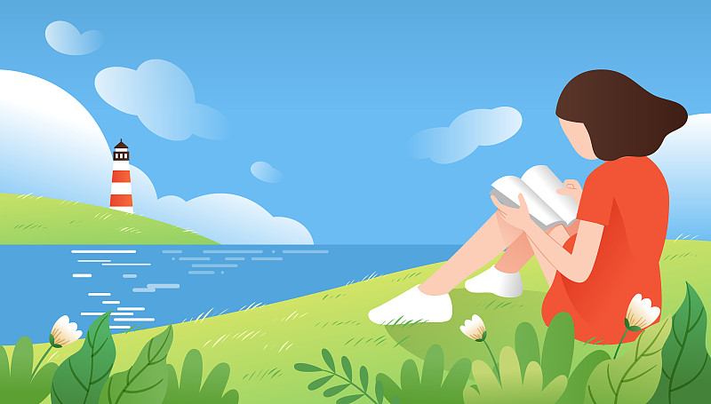 一个女孩坐在海边的山坡上看书图片素材