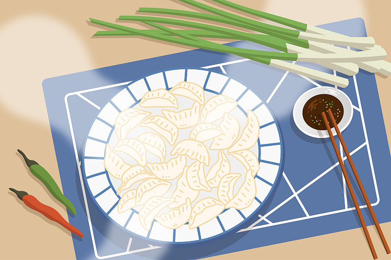 蓝布上的一盘饺子图片下载