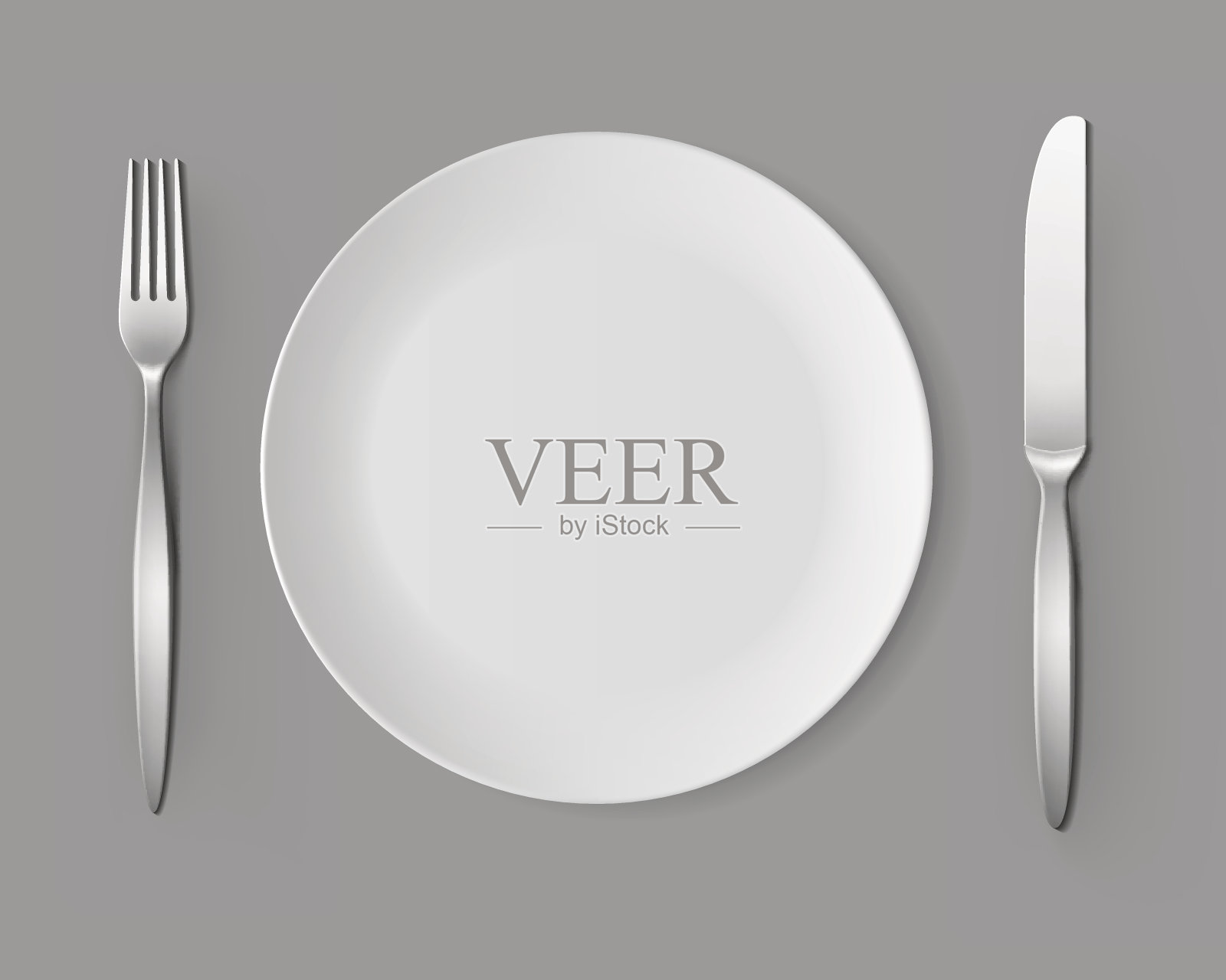 白色空圆盘子与叉和刀桌子设置设计元素图片