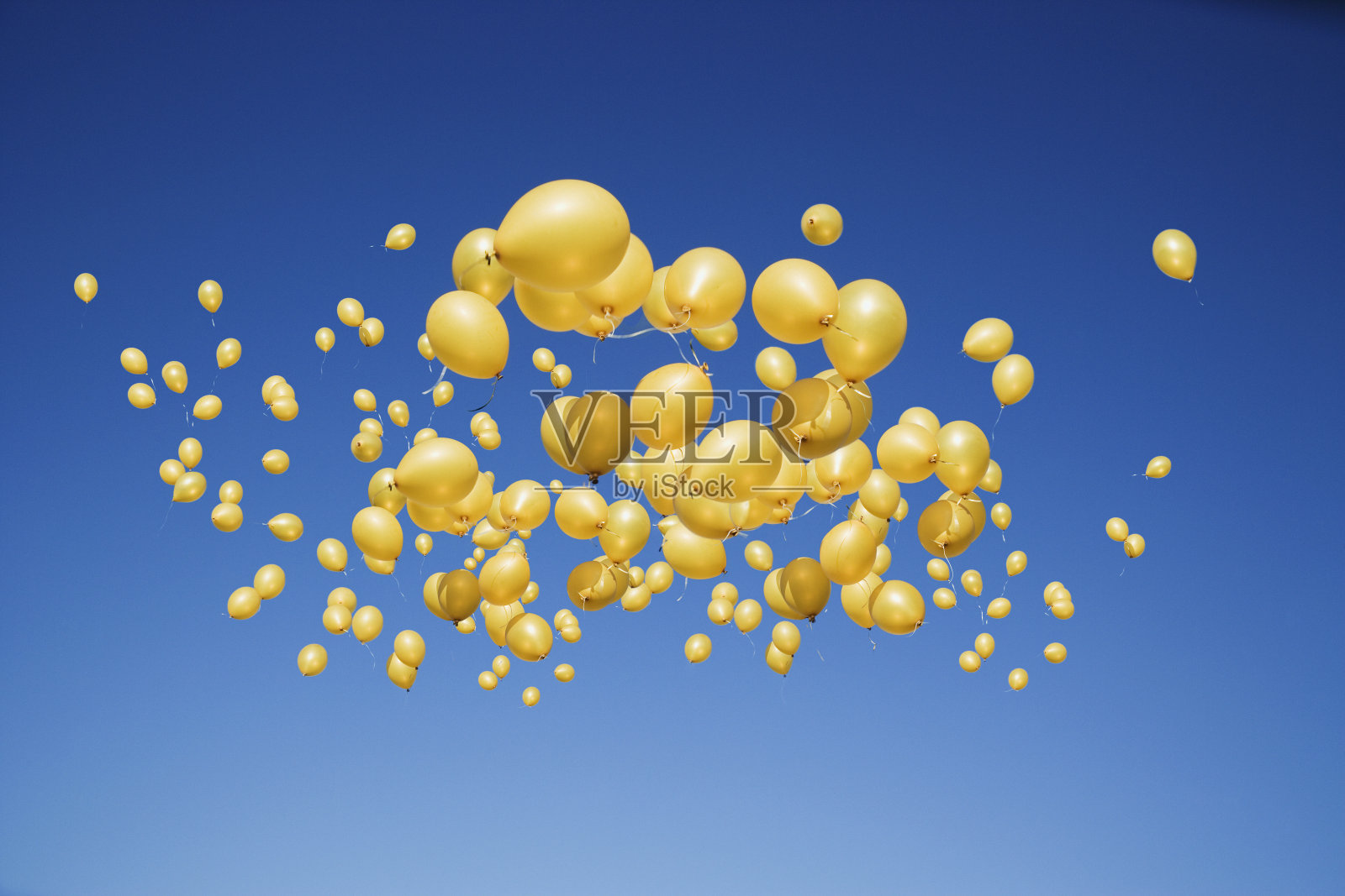 黄色的气球。照片摄影图片