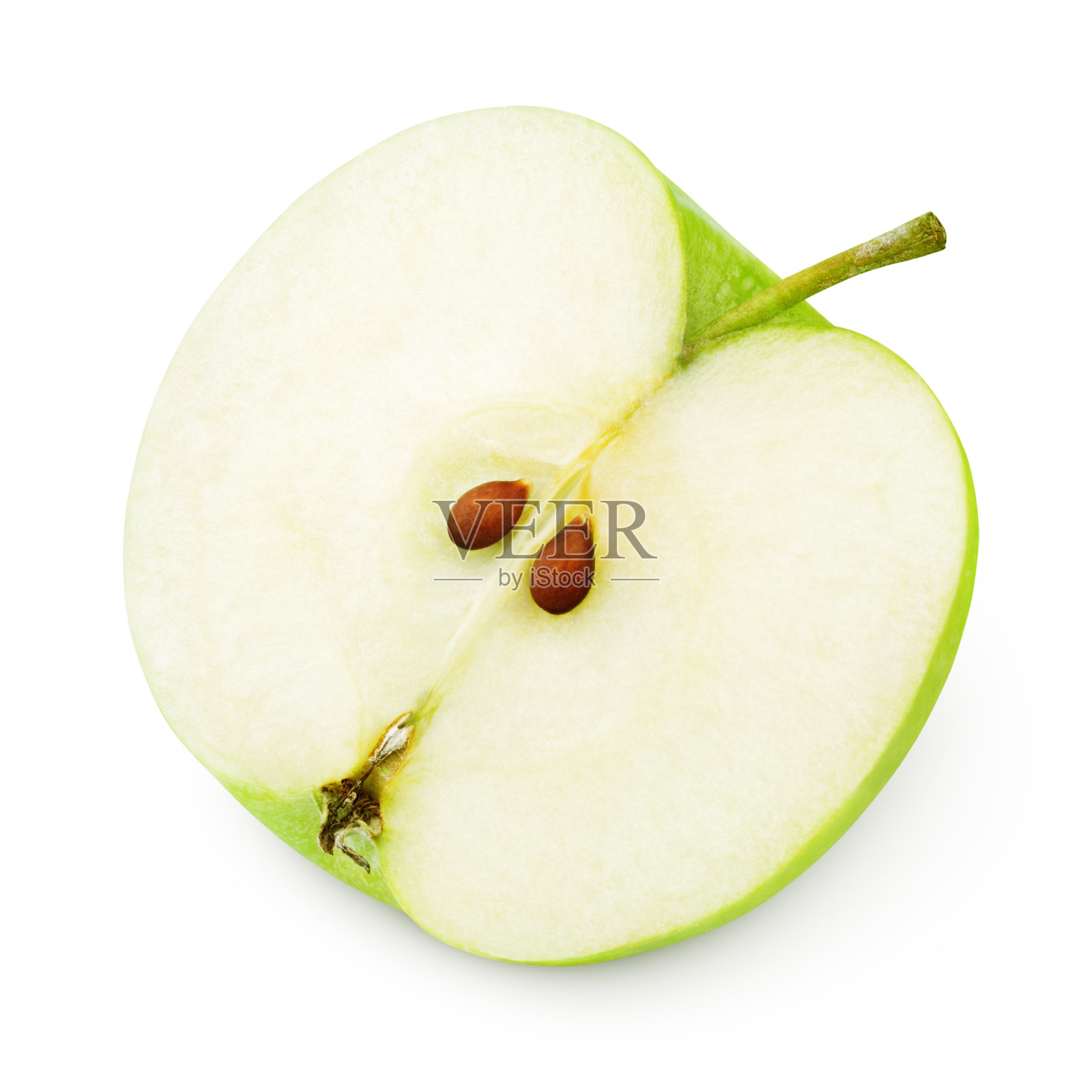 一半熟透的青苹果放在白色的上面照片摄影图片